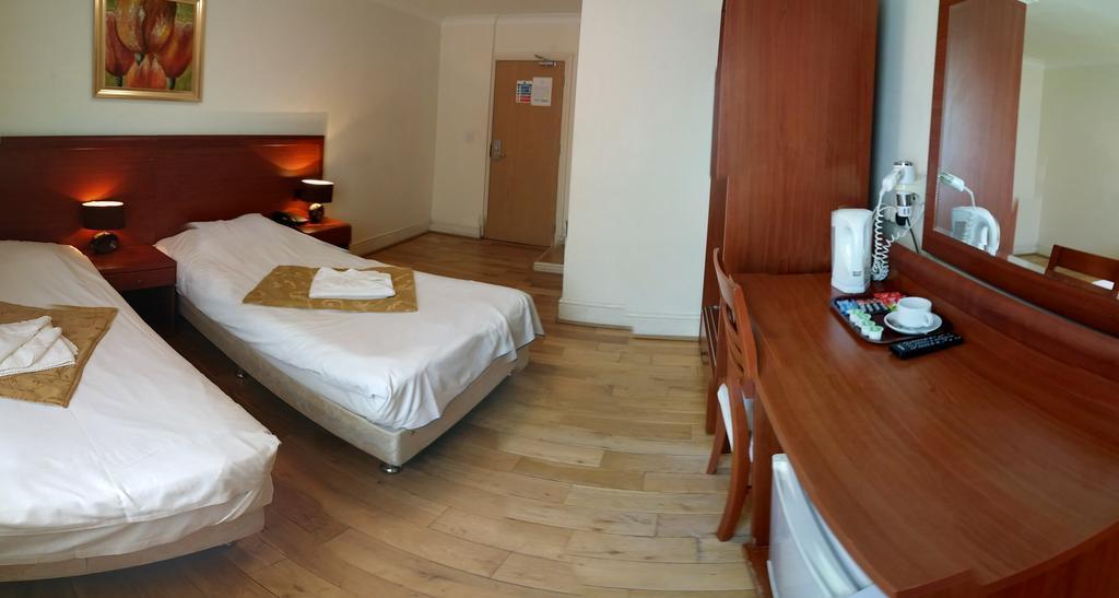 Corner House Hotel Londres Quarto foto