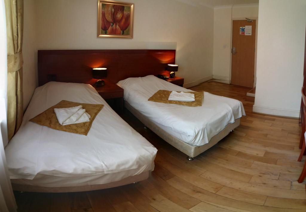 Corner House Hotel Londres Quarto foto