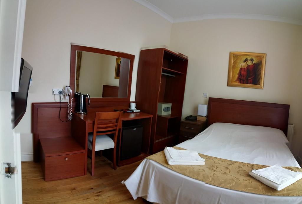 Corner House Hotel Londres Quarto foto