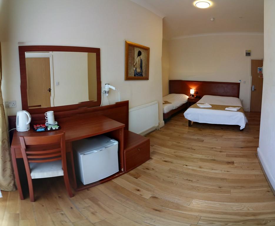 Corner House Hotel Londres Quarto foto