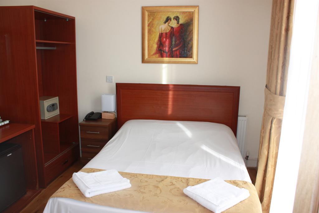 Corner House Hotel Londres Quarto foto