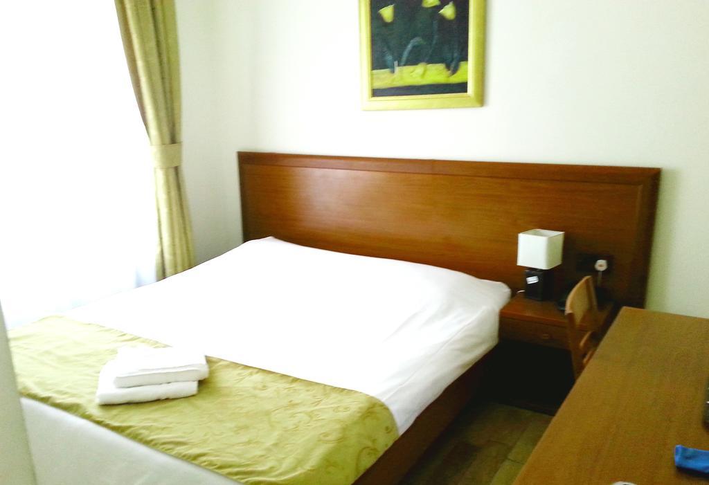 Corner House Hotel Londres Quarto foto