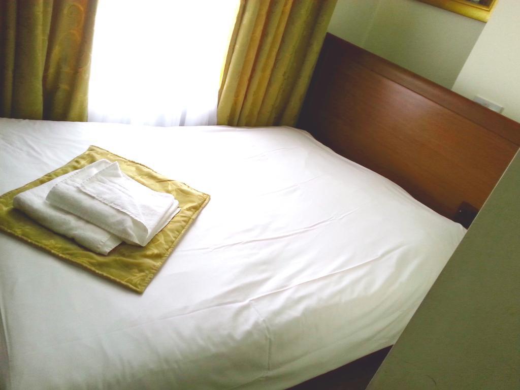 Corner House Hotel Londres Quarto foto